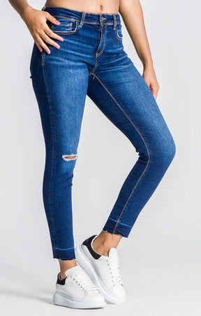 Blue Jeans With Ripped Hem